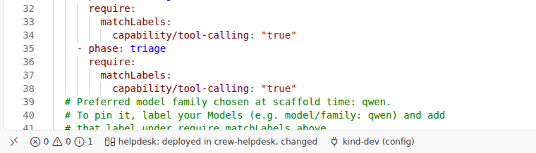 The status bar of a VS Code window: the crew of the open file, “helpdesk: deployed in crew-helpdesk, changed”, and the connection, “kind-dev (config)”.